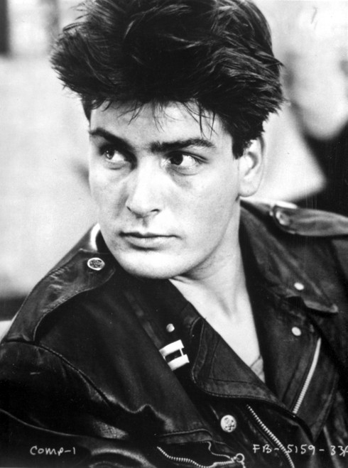 Charlie Sheen wearing a leather jacket Photo Print - Item # VARCEL684978