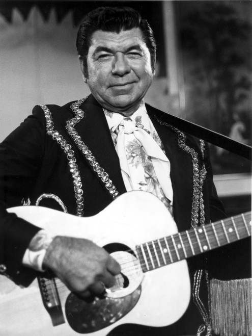 Claude Akins playing guitar Photo Print - Item # VARCEL685048