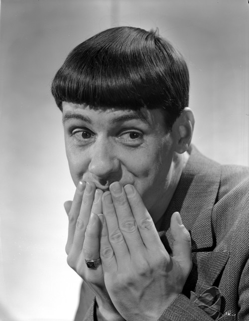 Ish Kabibble with hands covering mouth Photo Print - Item # VARCEL685079