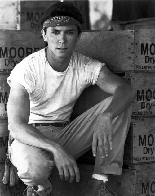 Lou Diamond Phillips crouching Photo Print - Item # VARCEL685132