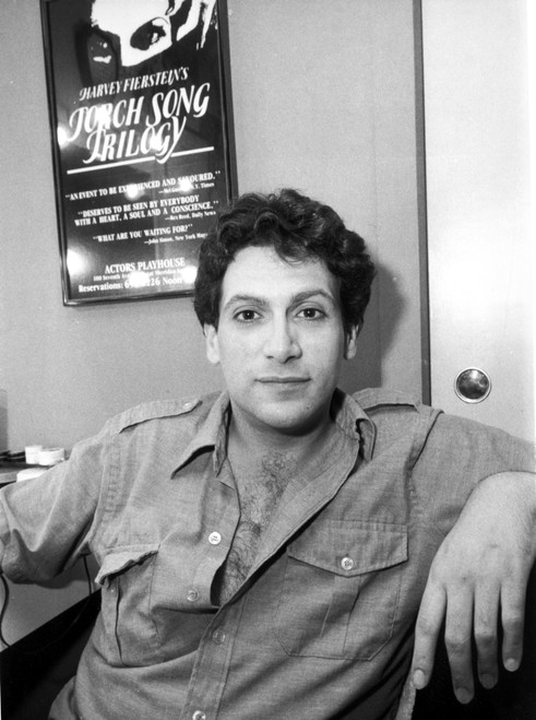 A Harvey Fierstein sitting in a restaurant Photo Print - Item # VARCEL685165