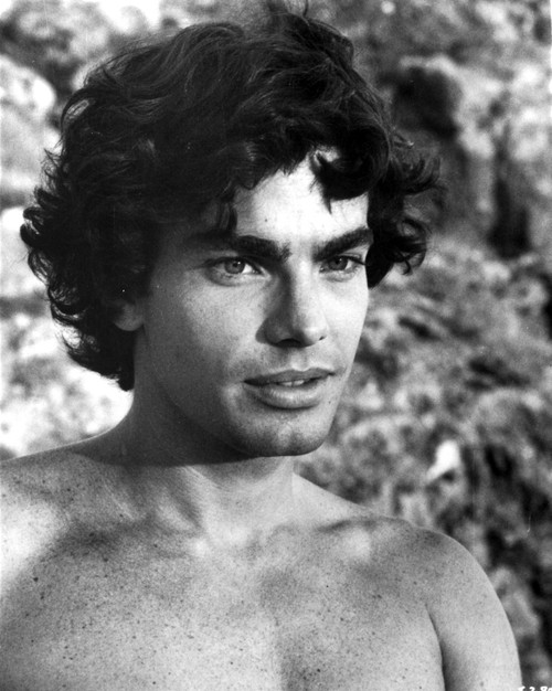 Film still of Peter Gallagher bare-chested outdoors Photo Print - Item # VARCEL685172