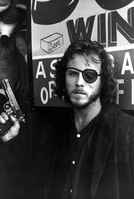 John Heard with a gun and eye patch Photo Print - Item # VARCEL685225