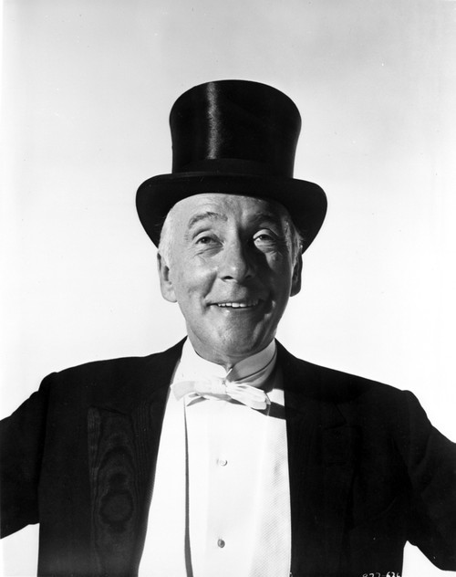 Wilfried Hyde-White wearing a top hat and tuxedo Photo Print - Item # VARCEL685281