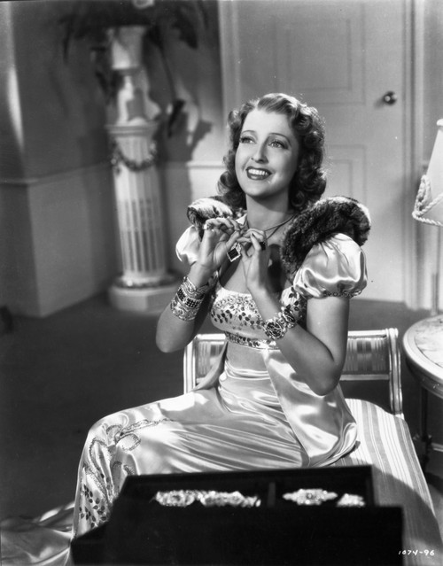 Jeanette MacDonald sitting in bed Photo Print