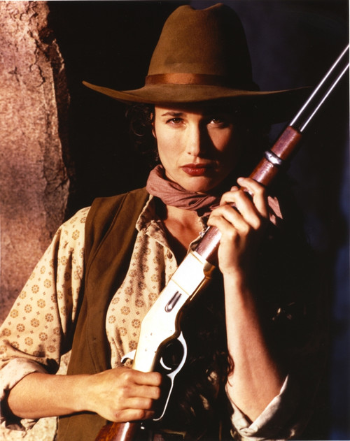 Andie MacDowell Posed in Cowgirl Outfit with Shotgun Photo Print - Item # VARCEL685314