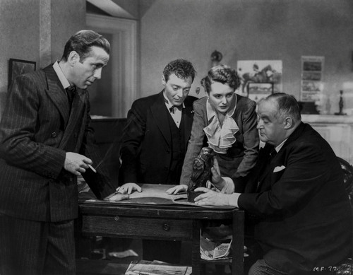 Film still of Humphrey Bogart and co stars in the Maltese Falcon Photo Print - Item # VARCEL685361