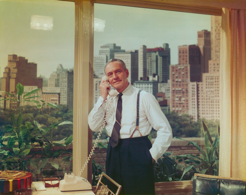 Frederic March in Jumper Talking on the Phone Photo Print - Item # VARCEL685446