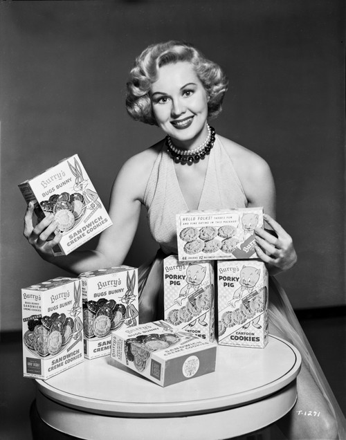 Virginia Mayo smiling and Endorsing a Product Photo Print - Item # VARCEL685730