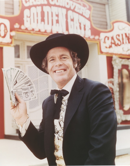 Doug McClure Holding Money in Tuxedo Photo Print - Item # VARCEL685768