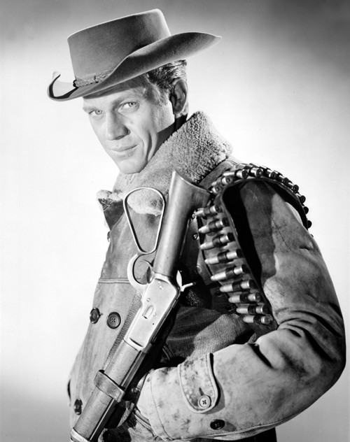 Publicity still of Steve McQueen with a gun Photo Print - Item # VARCEL685810