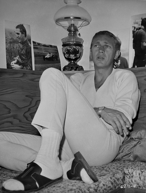 Steve McQueen Seated in Bed wearing White Long Sleeves and White Pants in Black and White Photo Print - Item # VARCEL685820