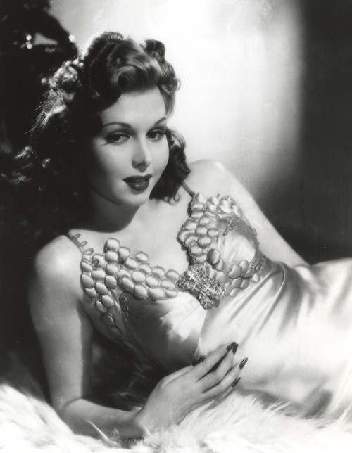 Ann Miller wearing a silk dress Photo Print - Item # VARCEL685918