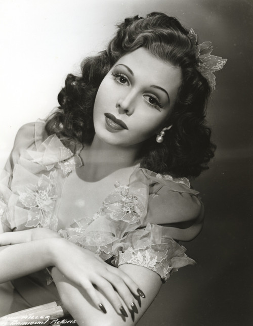 Ann Miller with her arms crossed Photo Print - Item # VARCEL685920