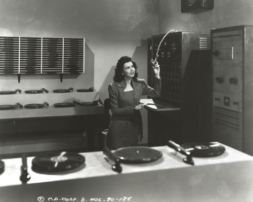 Ann Miller Operating on a Radio Station in a Classic Portrait Photo Print - Item # VARCEL685927