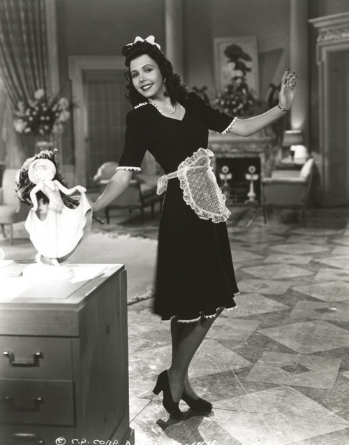 Ann Miller wearing a Maid Outfit in a Classic Portrait Photo Print - Item # VARCEL685939