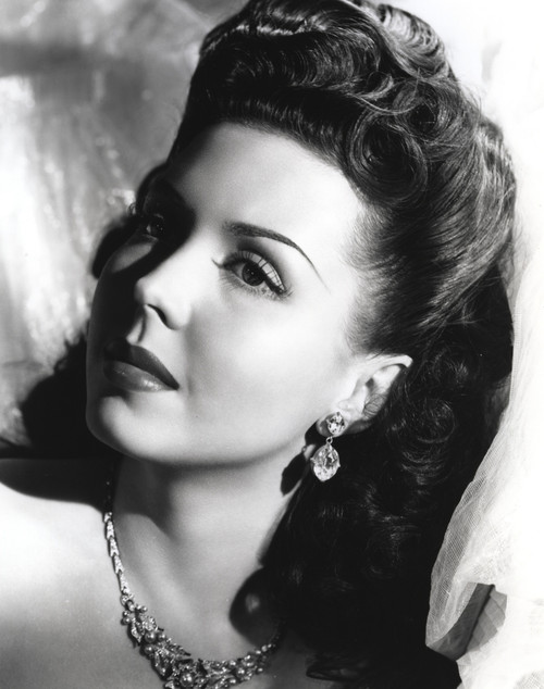 Ann Miller Looking Away From the Camera wearing Earrings and Necklave in a Classic Portrait Photo Print - Item # VARCEL685949