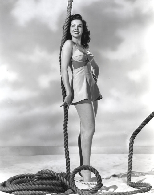 Ann Miller wearing Minders while Holding a Rope in a Classic Portrait Photo Print - Item # VARCEL685953