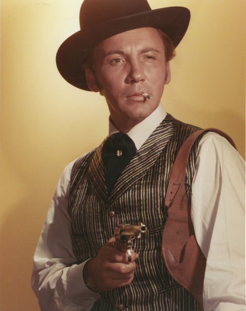Cameron Mitchell Holding Pistol in Gray Stripes Vest Photo Print - Item # VARCEL686037