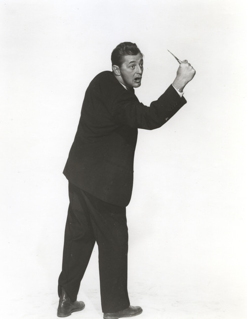 Robert Mitchum as Harry Powell Photo Print - Item # VARCEL686053