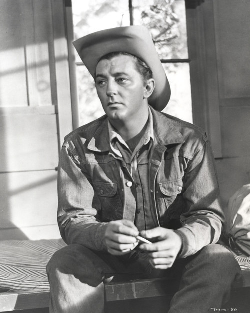 Film still featuring Robert Mitchum as a cowboy Photo Print - Item # VARCEL686062