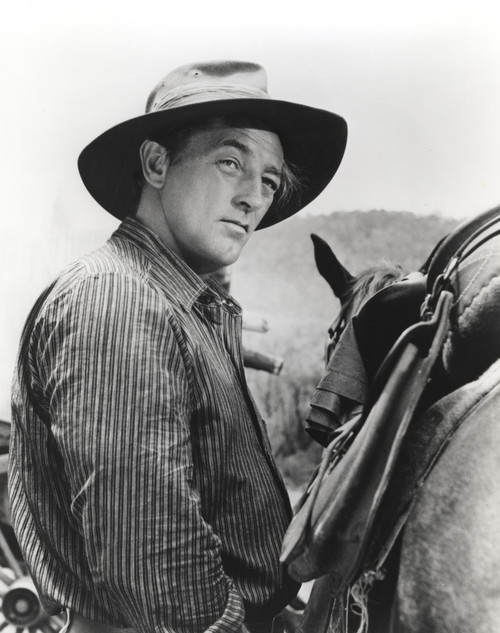 Film still featuring Robert Mitchum as a cowboy Photo Print - Item # VARCEL686092