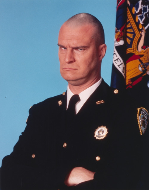Richard Moll Frowning in Police Uniform Portrait Photo Print - Item # VARCEL686115