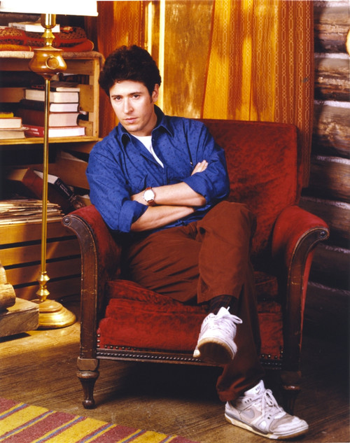 Rob Morrow sitting in Blue long sleeve Photo Print - Item # VARCEL686242