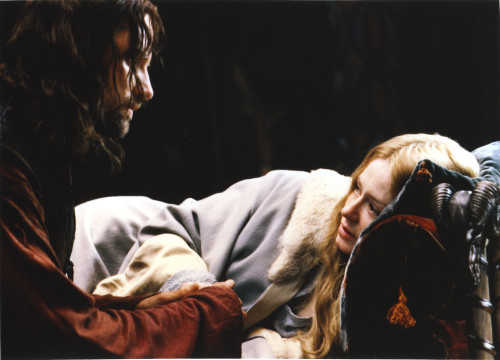 Viggo Mortensen Talking to Blonde Lady Lying on Bed Photo Print - Item # VARCEL686244