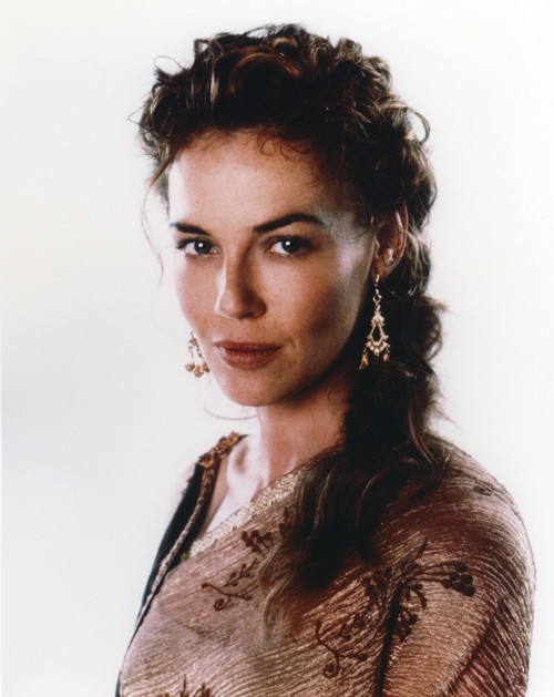 Connie Nielsen in Brown Dress with White Background Photo Print - Item # VARCEL686446