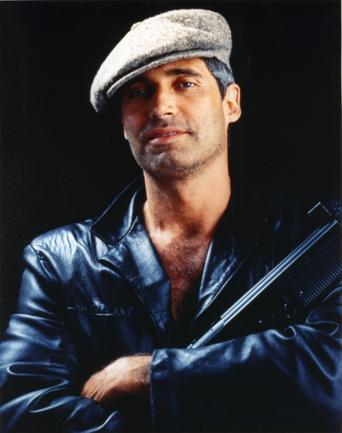 Michael Nouri in Black Leather Jacket With Rifle Portrait Photo Print - Item # VARCEL686471