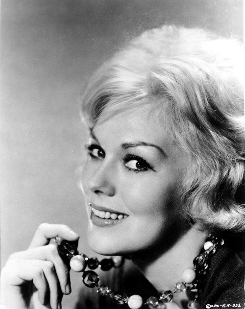 Kim Novak holding her necklace Photo Print - Item # VARCEL686474