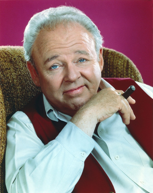 Carroll O'Connor wearing a Red Vest and White Polo with Tobacco Photo Print - Item # VARCEL686626
