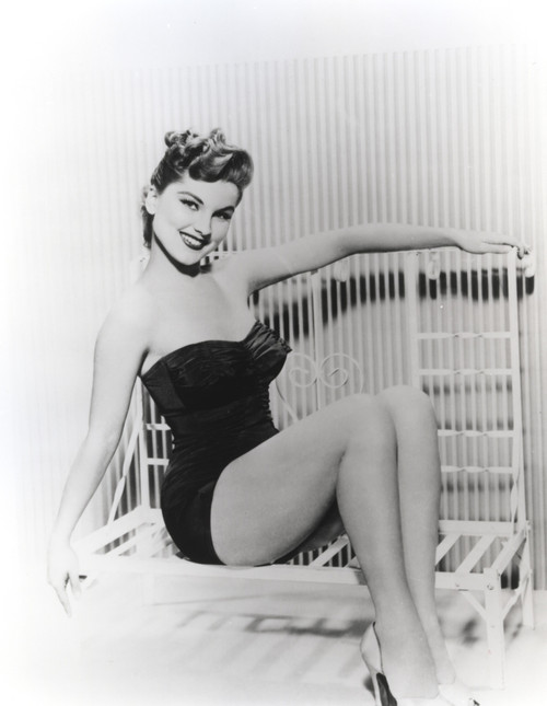 Debra Paget on a bench Photo Print - Item # VARCEL686789