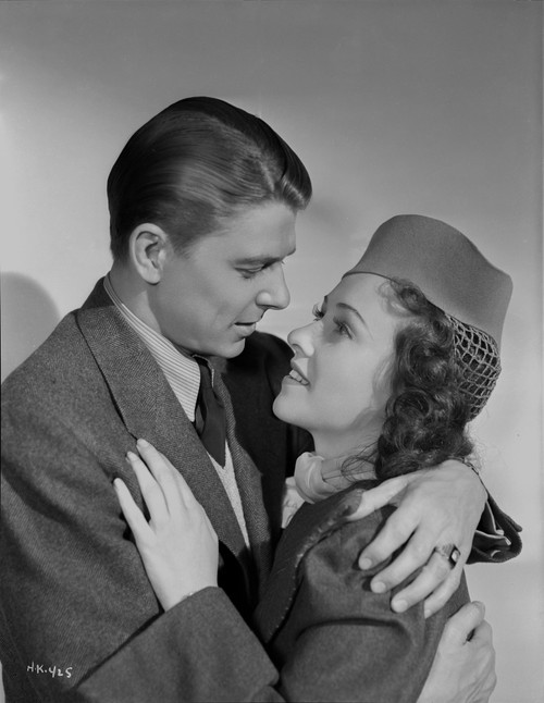 Ronald Reagan Getting Romantic with Woman Photo Print - Item # VARCEL687037