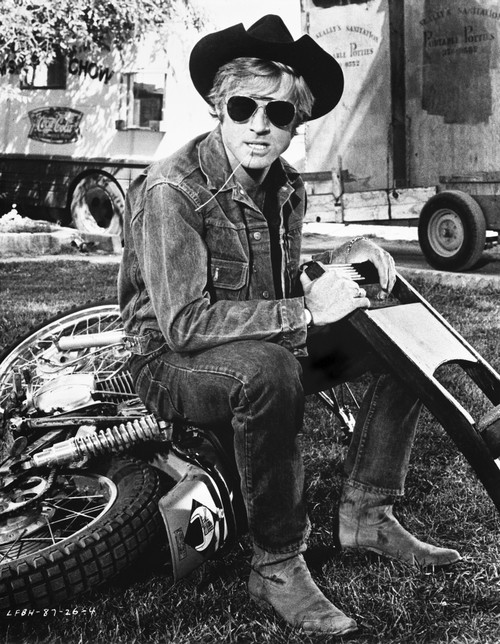 Robert Redford wearing a cowboy hat on a motorcycle Photo Print - Item # VARCEL687050
