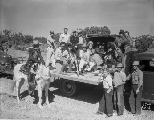 Tex Ritter on horseback beside a film crew Photo Print - Item # VARCEL687112
