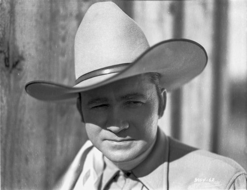 Tex Ritter in a cowboy hat Photo Print - Item # VARCEL687119