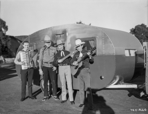 Tex Ritter and a band beside a trailer Photo Print - Item # VARCEL687121
