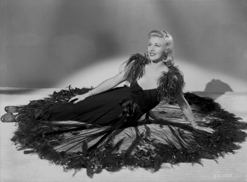 Ginger Rogers Posed wearing Black Feather Gown Photo Print - Item # VARCEL687229