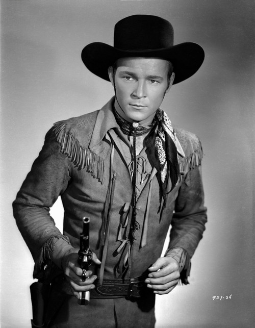 Roy Rogers posed in Cowboy Outfit and Holding a Gun Photo Print - Item # VARCEL687267