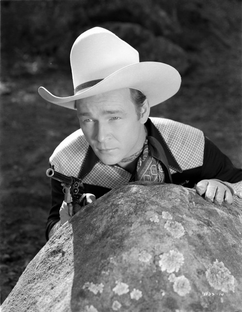 Roy Rogers Taking Cover Behind Huge Rock Photo Print - Item # VARCEL687260
