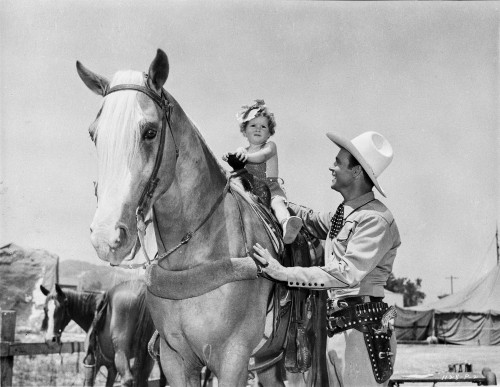 Roy Rogers smiling with A Little Girl and A Horse Photo Print - Item # VARCEL687279