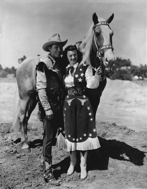 Roy Rogers and a woman with a horse Photo Print - Item # VARCEL687280