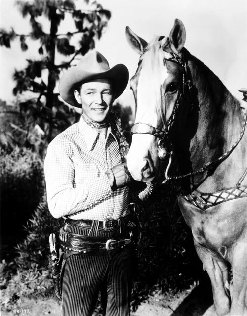 Roy Rogers in a cowboy costume with a horse Photo Print - Item # VARCEL687325