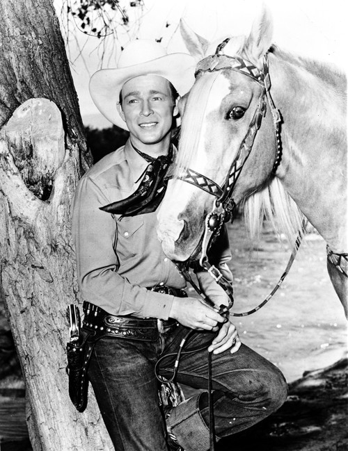 Roy Rogers in a cowboy costume with a horse Photo Print - Item # VARCEL687328