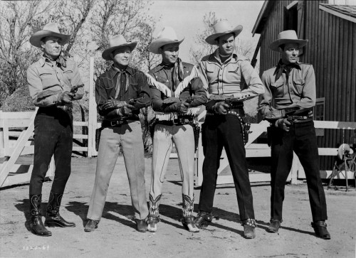 Roy Rogers standing with Men in Black and White Photo Print - Item # VARCEL687343