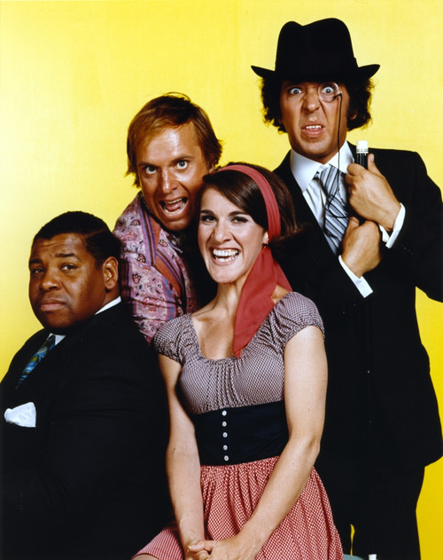 Rowan & Martin Laugh In Cast with Yellow Background Photo Print - Item # VARCEL687386