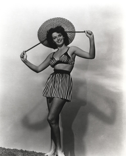 Jane Russell wearing a striped outfit and straw hat Photo Print - Item # VARCEL687436