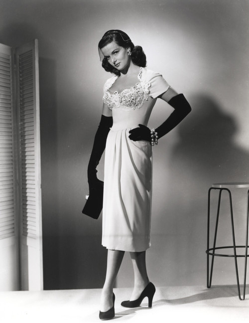 Jane Russell Posed in White Silk Shoulder Dress and Black Silk Gloves with Left Hand on the Waist Photo Print - Item # VARCEL687494